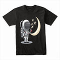 Cosmic Dreamer: Star Painter Astronaut Tee