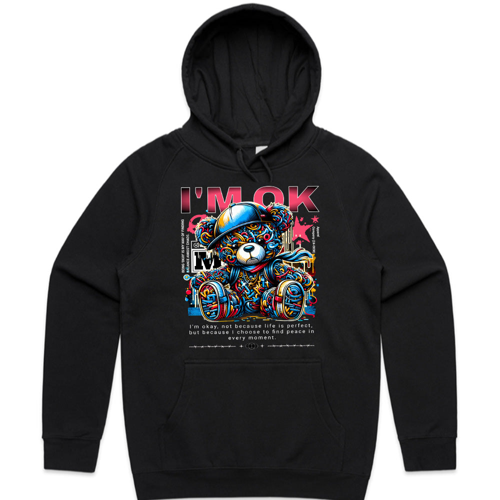 Urban Serenity: Vibrant “I’m OK” Teddy Tee